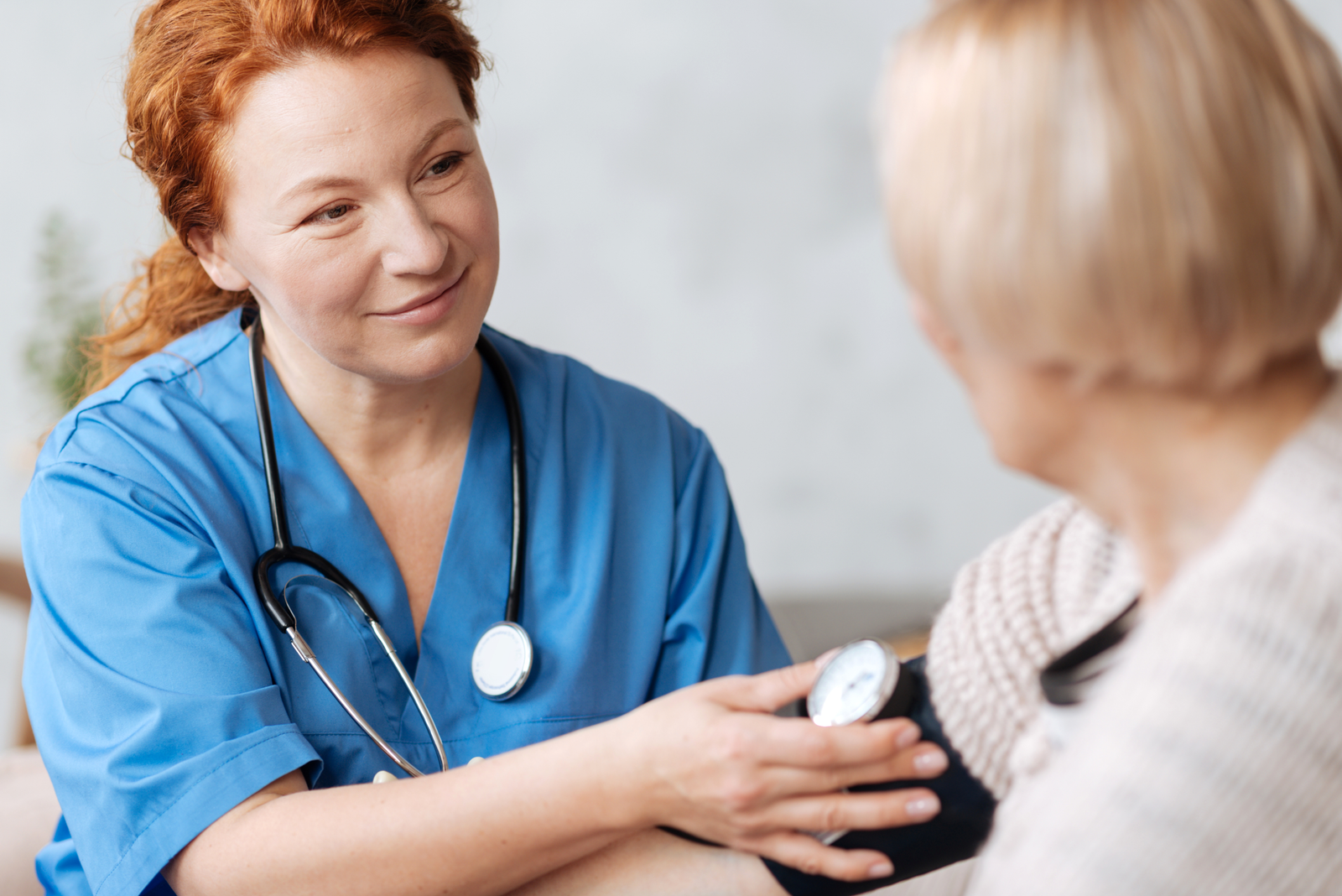 A nurse with an elderly client